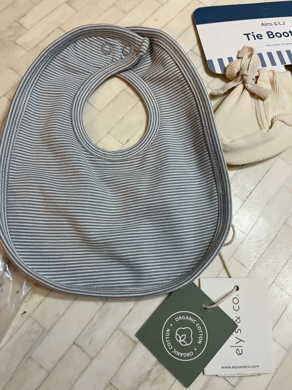 Ains & LJ White Organic Baby Hat + Tie Booties with Gray Striped Bib